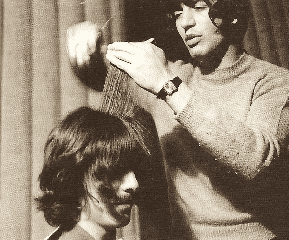George Harrison having his hair cut by Leslie Cavendish.