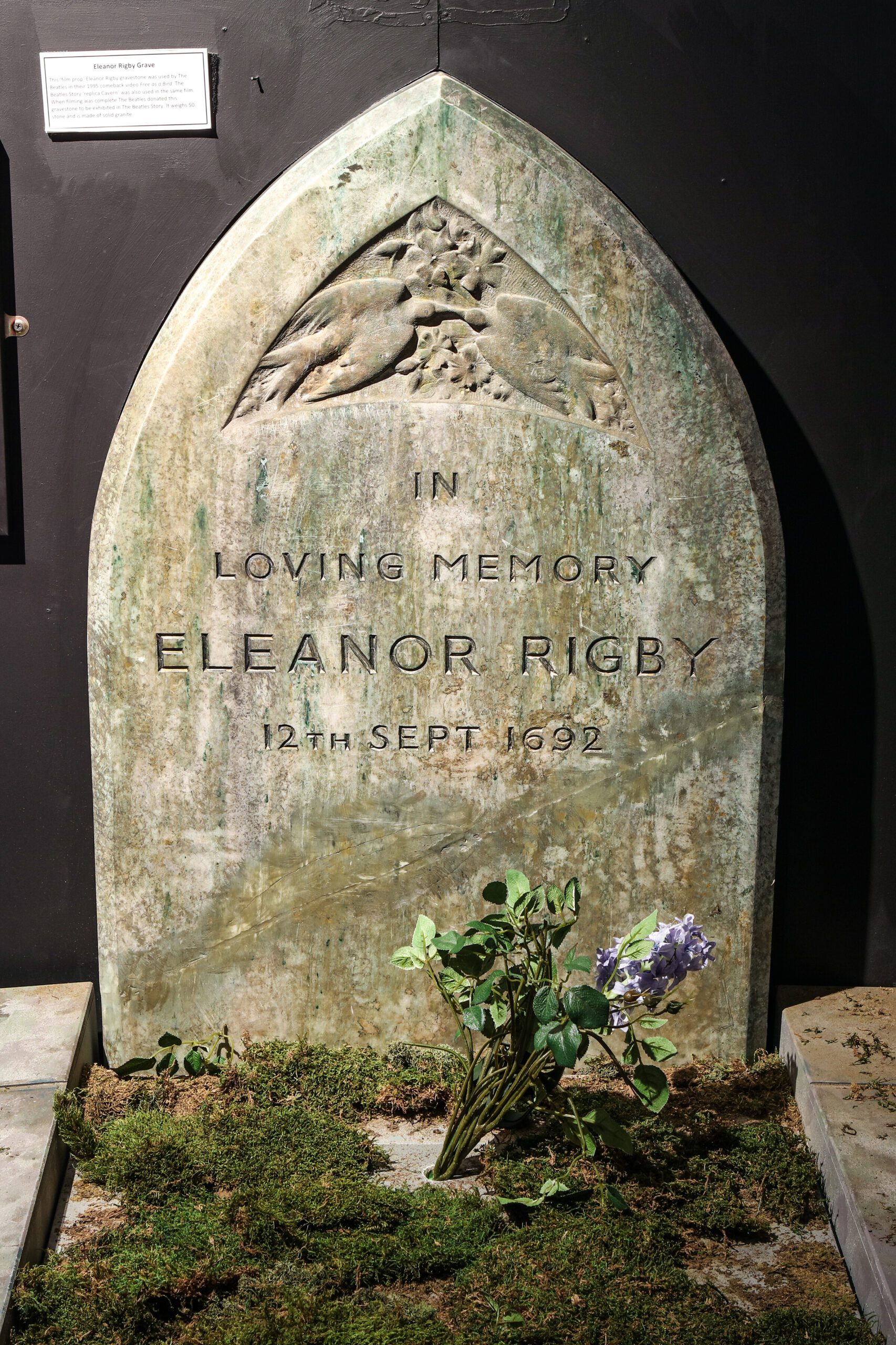 eleanor rigby prop grave on display at the beatles story museum, liverpool