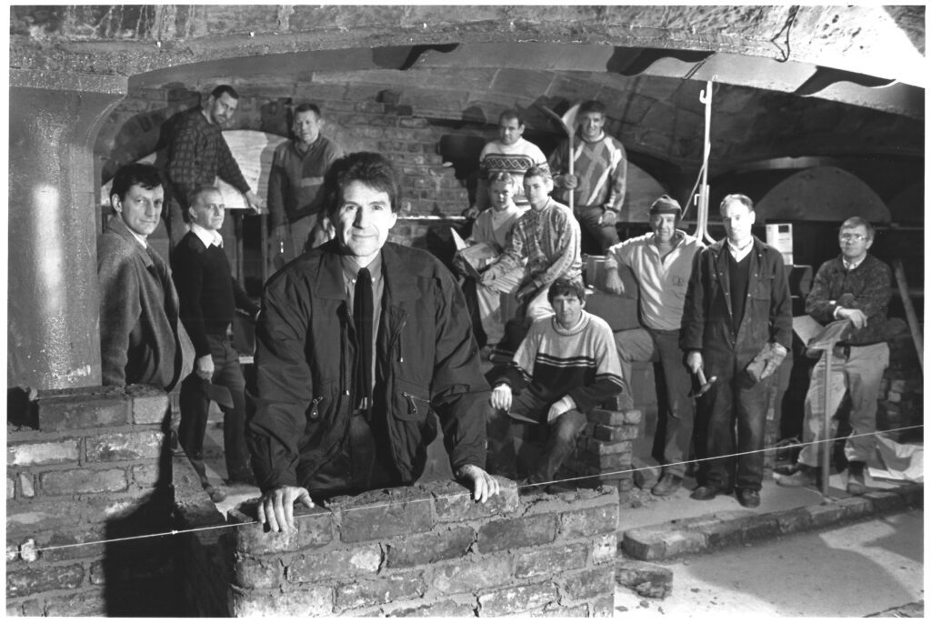 Mike with architect and builders when The Beatles Story was being built in 1990
