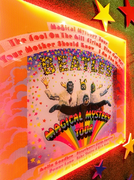 the album cover for magical mystery tour by the beatles on display at the beatles story, liverpool