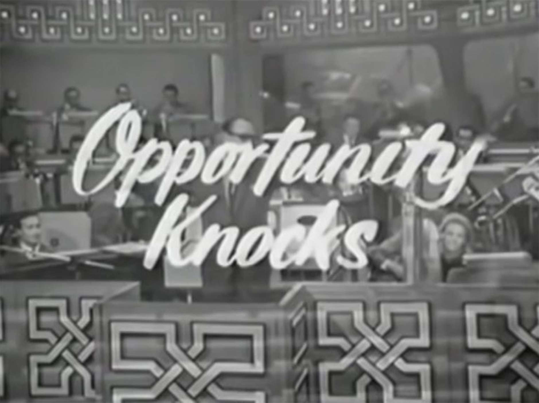 a black and white still of 'opportunity knocks'