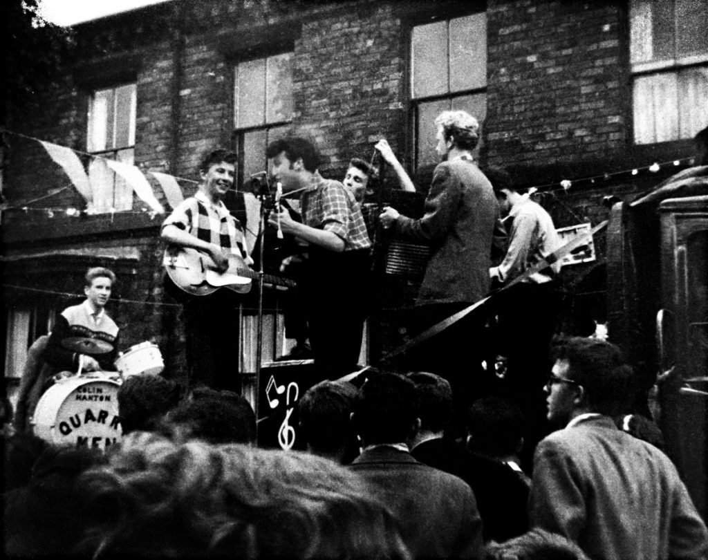 Charlie Roberts and John Lennon performing with The Quarrymen.