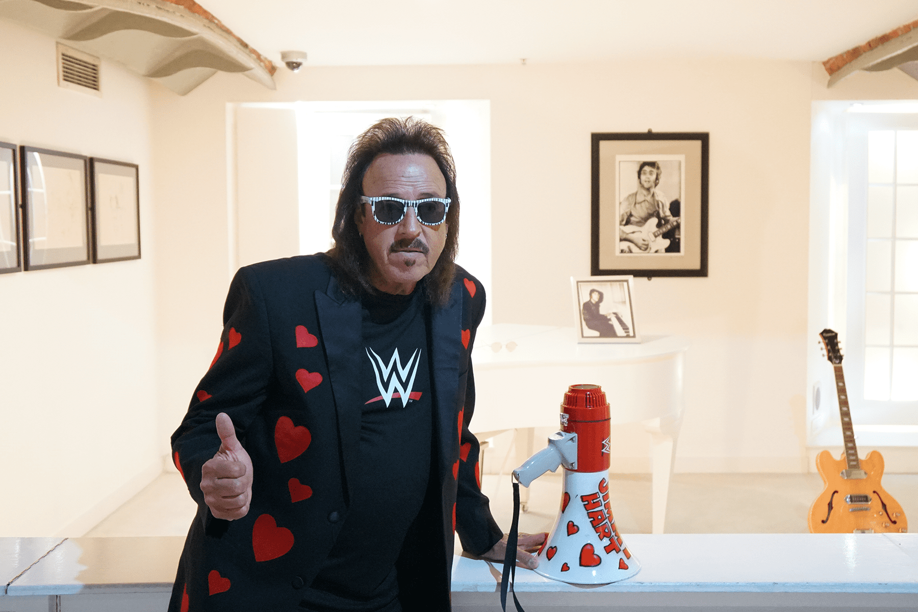 WWE legend Jimmy Hart visits The Beatles Story