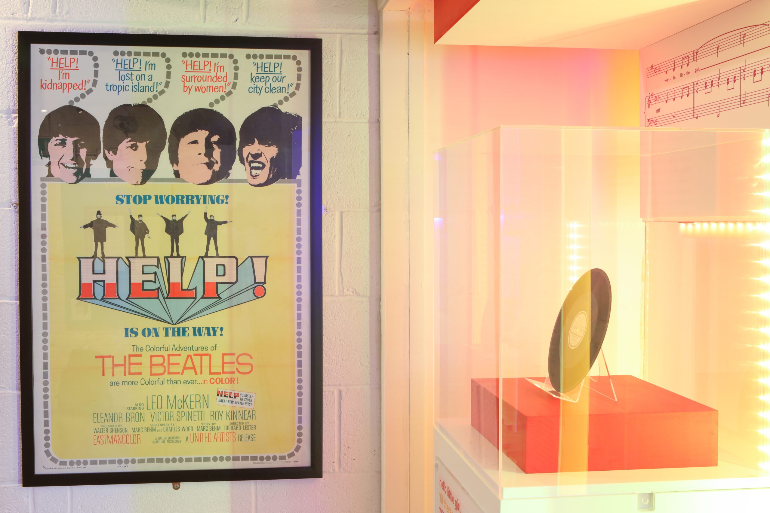 A movie poster for the album's namesake film "Help!", located at The Beatles Story.