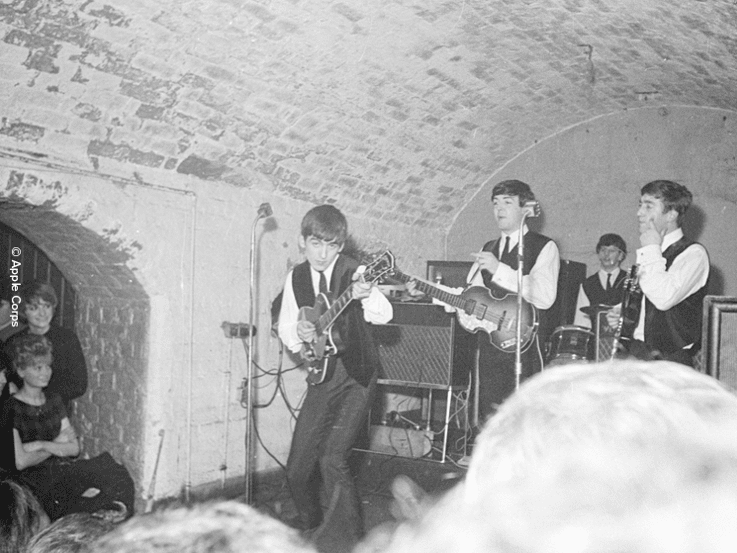 Picture: The Beatles play at the original Cavern Club in Liverpool.