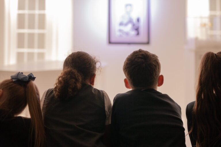 Visitors in front of the White Room exhibit