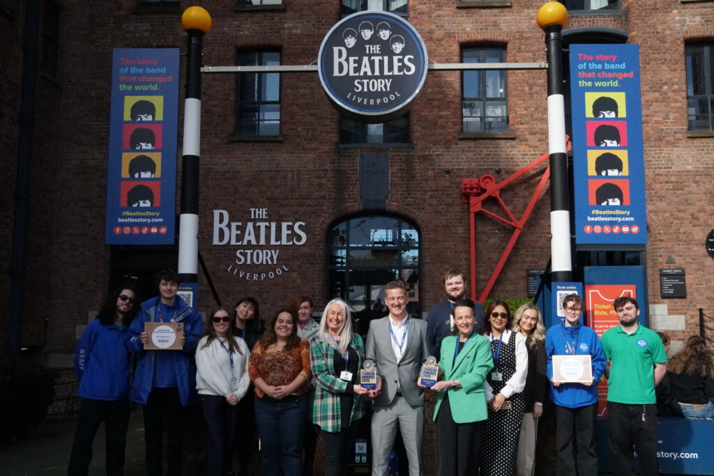 The Beatles Story staff with the trophy won for Liverpool City Region International Tourism Award 2025, which allowed us to be listed as a finalist in VisitEngland Awards for Excellence 2026.