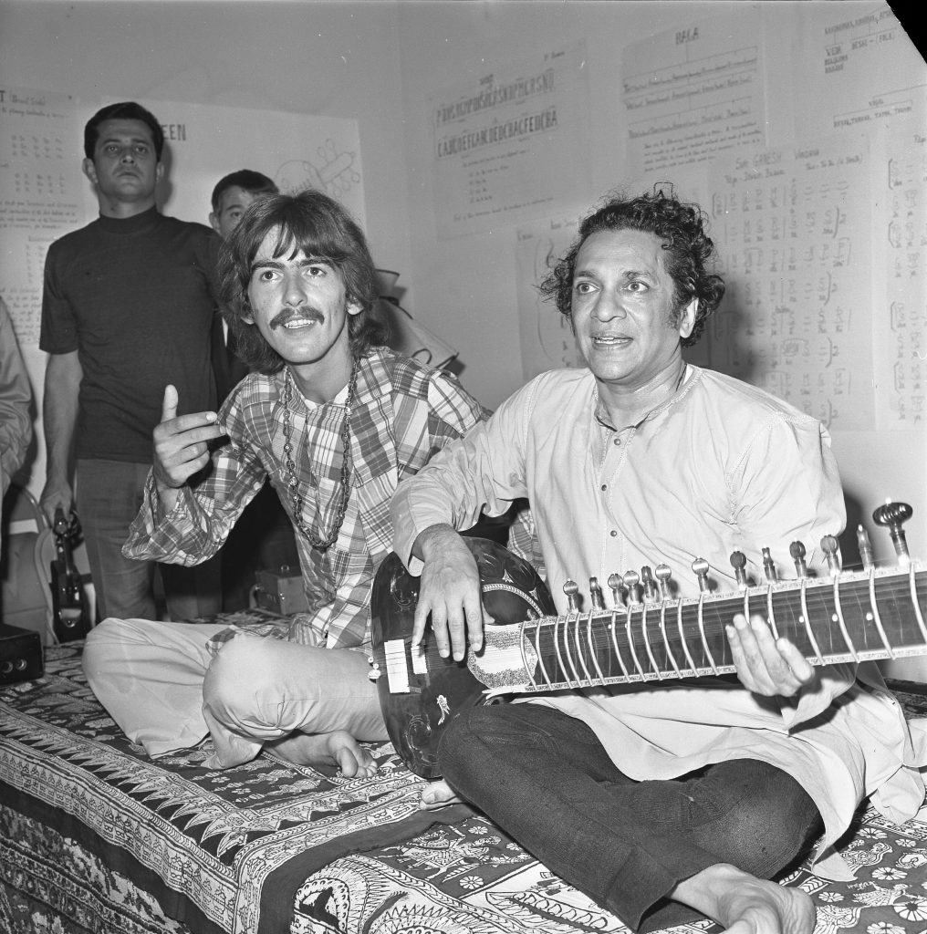 George Harrison with Ravi Shankar, the sitar maestro who taught him how to play the instrument. Image by John Malmin.